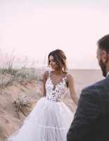 Romantic Bohemian Wedding Dresses V-neck Sleeveless Lace Flowers Beach Bridal Gowns